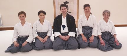 Penny, far right, receiving hakama rank from Takeharu Noro, April 2, 2019 at Korindo Dojo, Paris